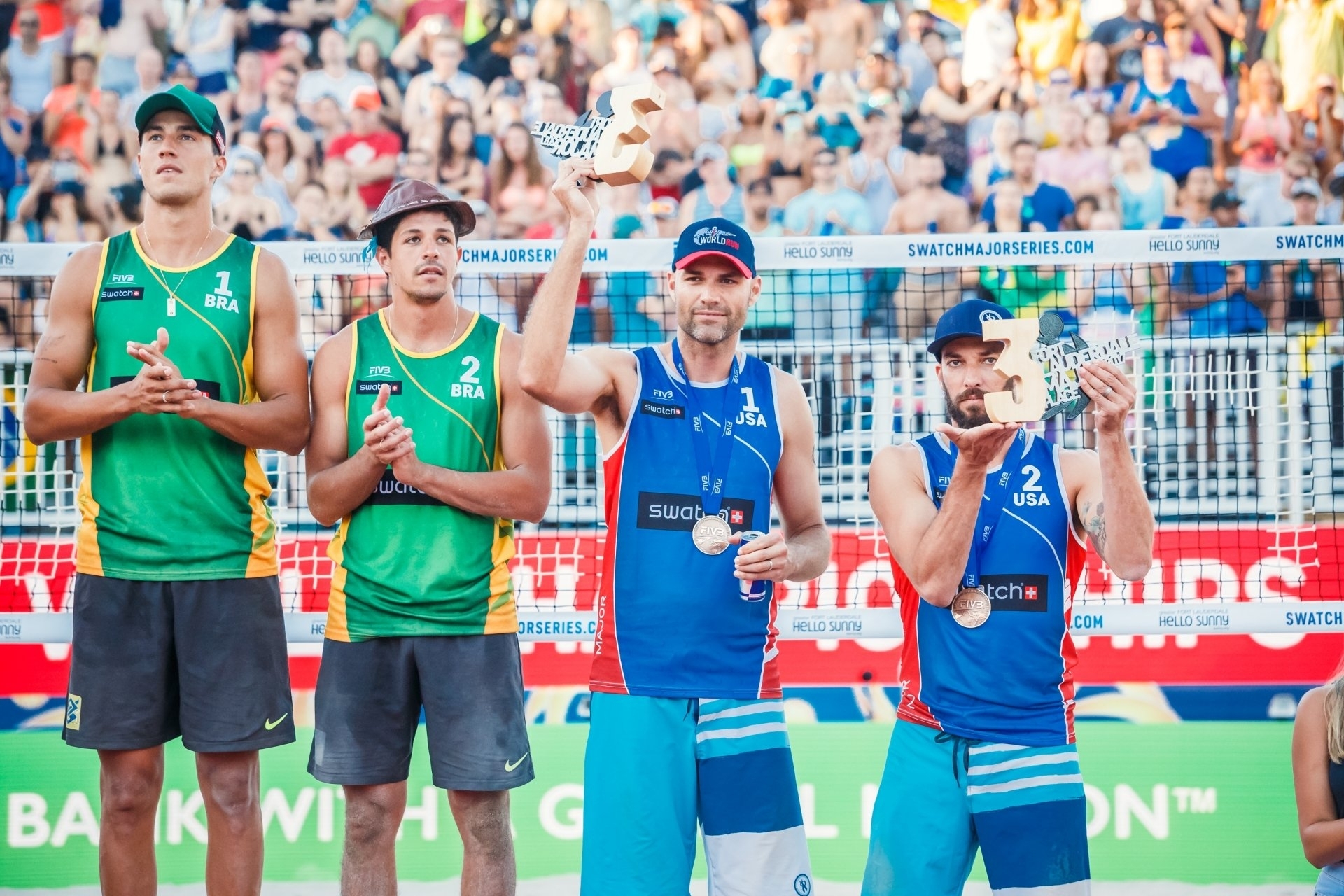 Will Lucena/Dalhausser (right) be smiling this year, or will Alvaro/Saymon (left) top the podium again?