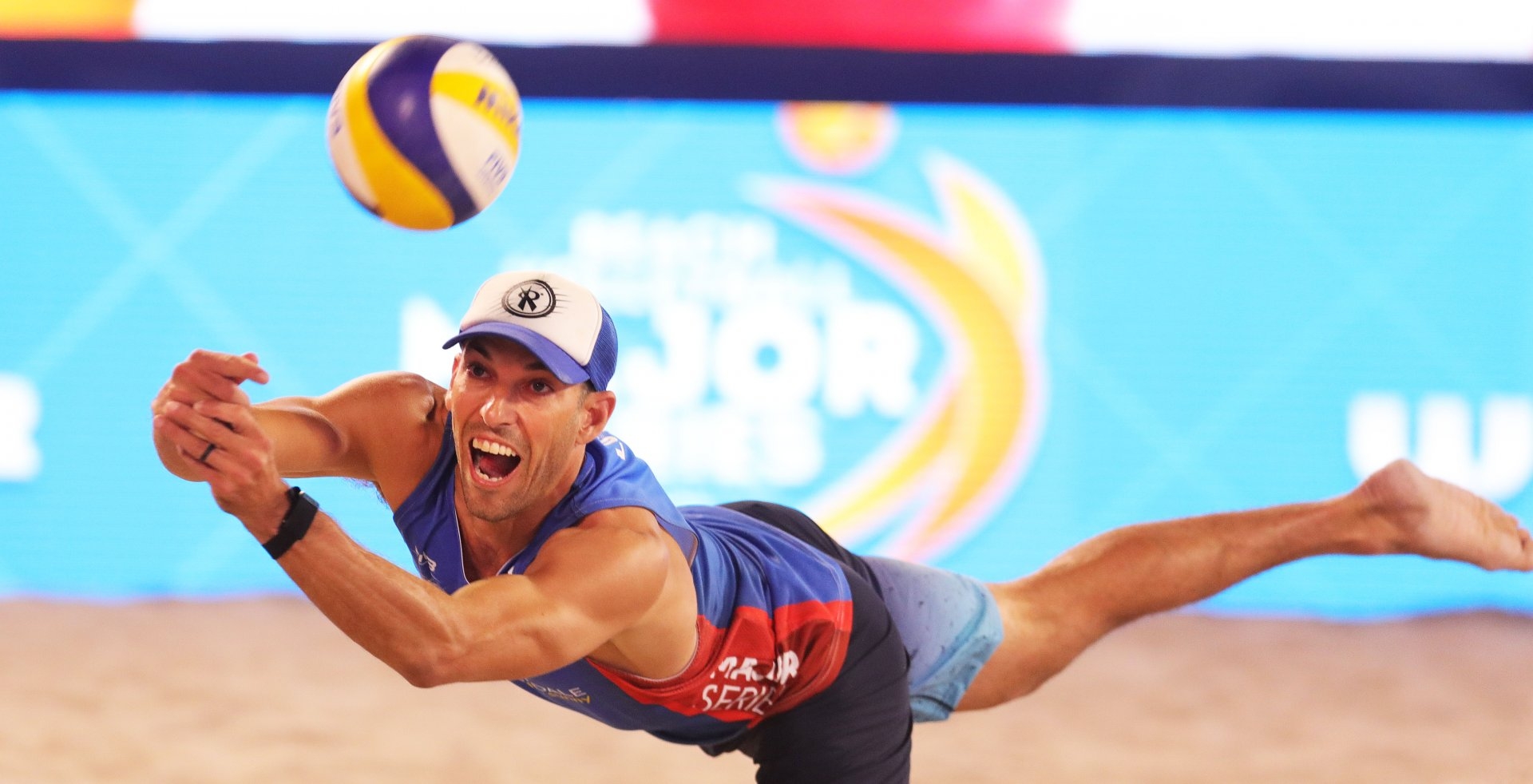 Nick Lucena dives to dig the ball (Photocredit: FIVB)